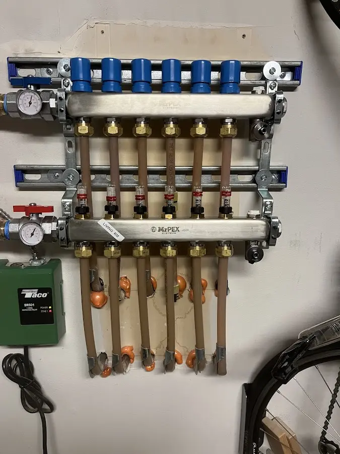 Plumber performing Leak Detection at a residential property in Ellington